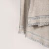 SERENA a grey throw, made of local merino wool showing its voluminous texture