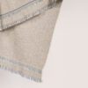 SERENA throw made of local merino wool origin spain in grey off tone detail